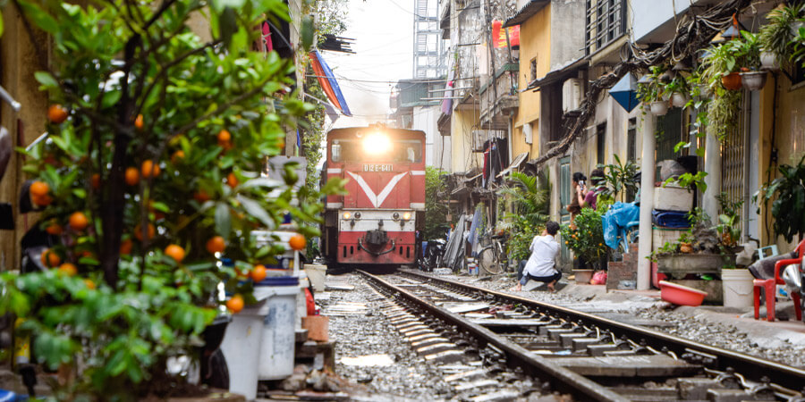 train through narrow streets