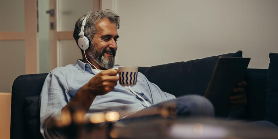 Man listening to music with earphones