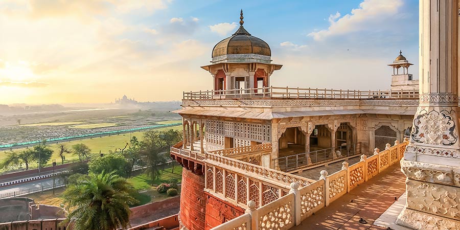 Agra Fort is an ornate Indian fort made of red sandstone and marble with an impressive dome.