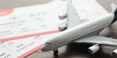 Flight Tickets And Model Airplane Adobestock 1169424951 900X450px
