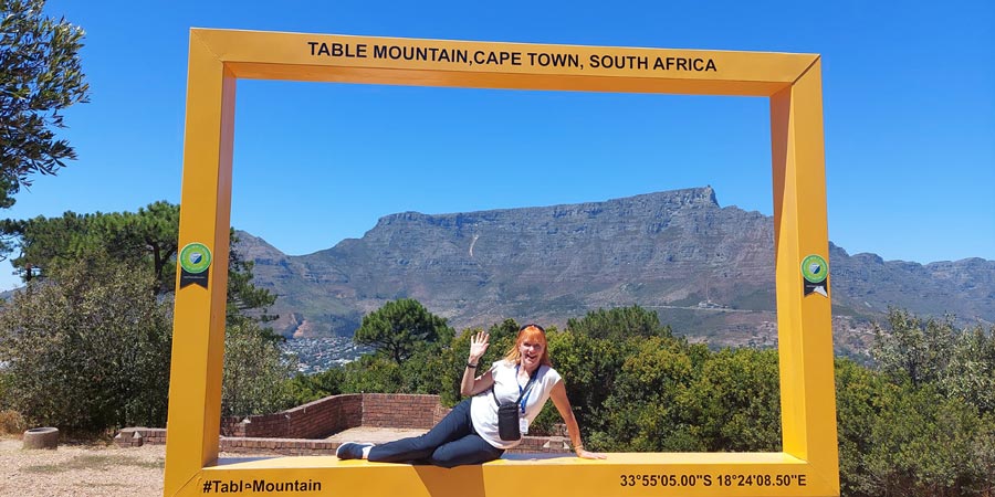 Angie poses for a photo in front of Table Mountain.