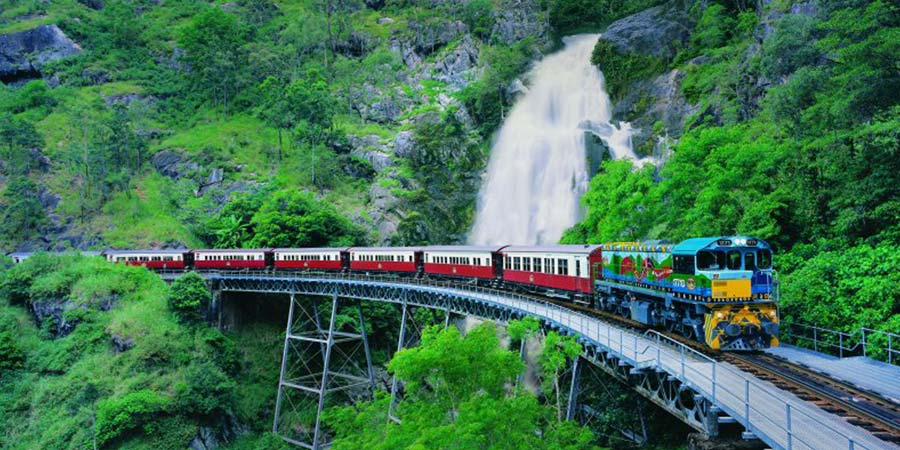 Riding the Kuranda Scenic Railway into a rainforest